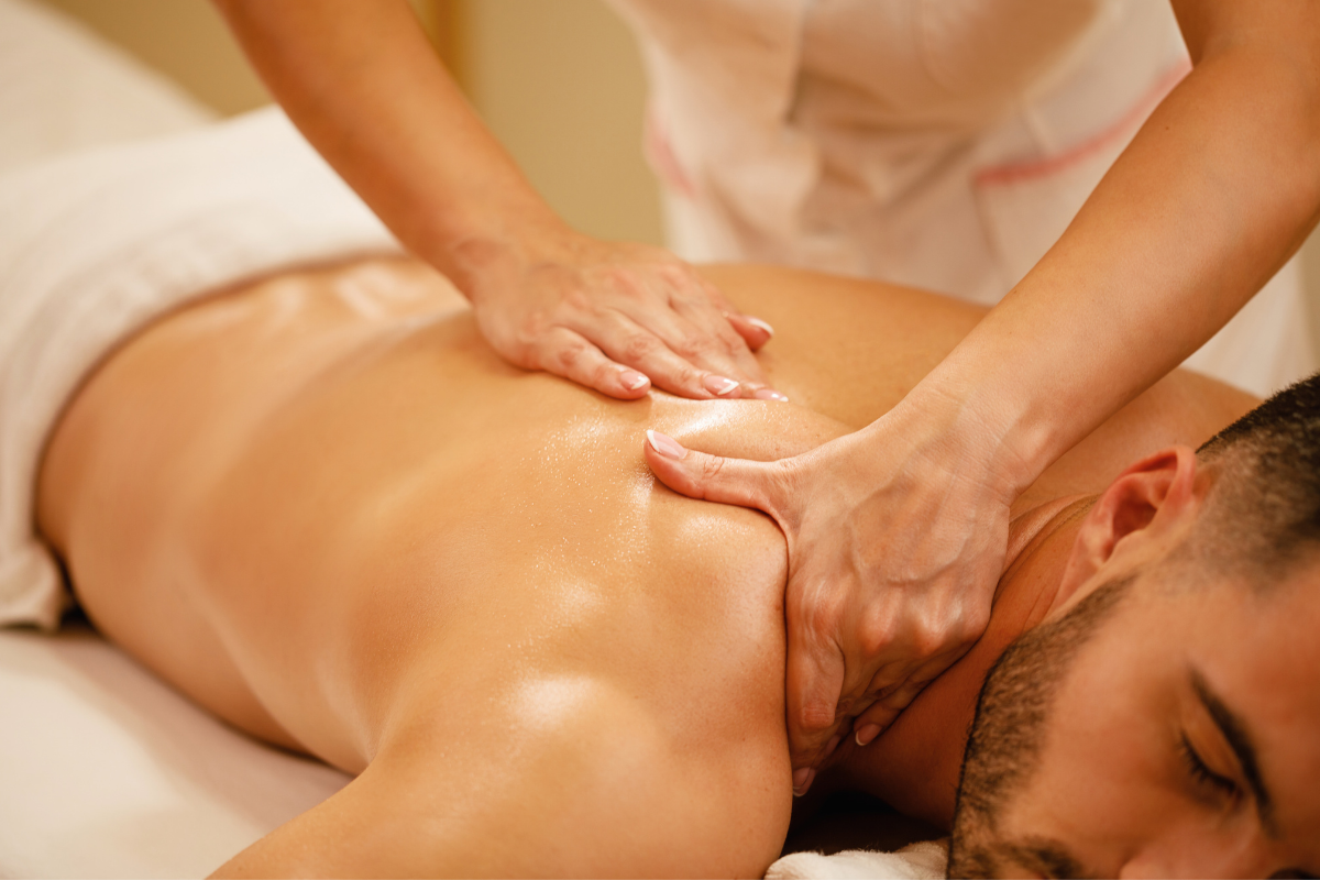 A professional massage treatment, emphasizing the wellness-centered lifestyle offered to residents.